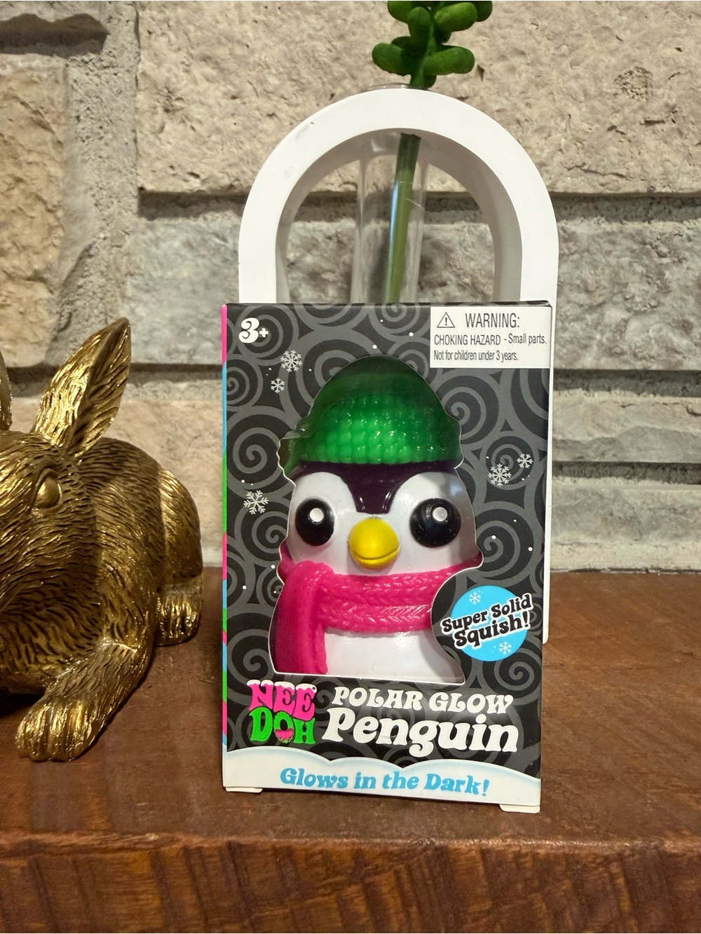 NeeDoh Polar Glow Penguin Squishy Toy - White with Pink Scarf & Green Hat